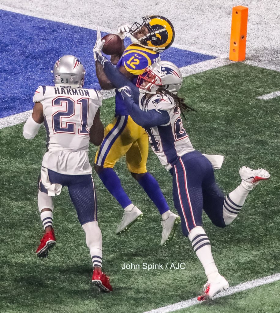 John Spink/Atlanta Journal-Constitution - New England Patriots strong safety Duron Harmon (21)(left) and New England Patriots cornerback Stephon Gilmore (24)(right) break up a pass to Los Angeles Rams wide receiver Brandin Cooks (12) near the end zone during 4th quarter action 
