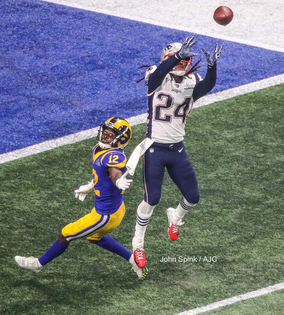 John Spink/Atlanta Journal-Constitution - New England Patriots cornerback Stephon Gilmore (24) gets an interception in the fourth quarter. 