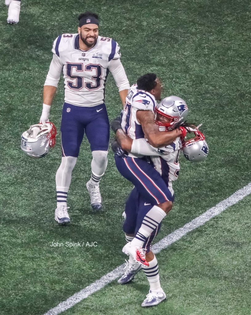 John Spink/Atlanta Journal-Constitution - New England Patriots middle linebacker Kyle Van Noy (53) moves to join in a early celebration with teammates, New England Patriots defensive back J.C. Jackson (27)(center) and New England Patriots outside linebacker Dont'a Hightower (54)(right) as the clock winds down.