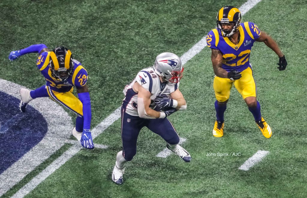 John Spink/Atlanta Journal-Constitution - New England Patriots running back Rex Burkhead (34) scrambles for yardage in the fourth quarter. 