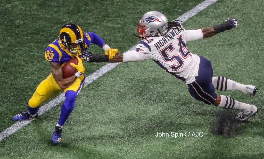 John Spink/Atlanta Journal-Constitution - Los Angeles Rams wide receiver Josh Reynolds (83) (left) tried to negotiate New England Patriots outside linebacker Dont'a Hightower (54) (right) during first quarter action.